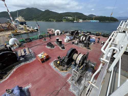 Repainting the Polar Endeavour's deck. 