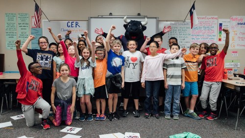 Group of students with TORO, the Houston Texans, mascot.