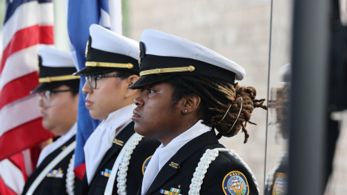 Military lining up for the flag raising