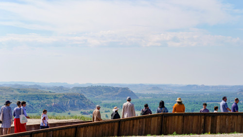 Library visitors marvel at the Badlands landscape. 