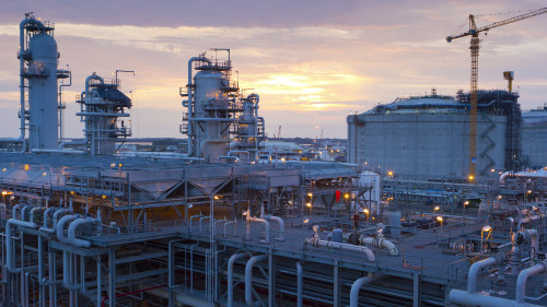 Side aerial view of plant at dusk