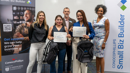 One of the students speaking in front of the rest of the participants.