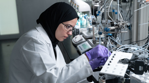 Process Lab, Scientist Eman with Adsorption unit