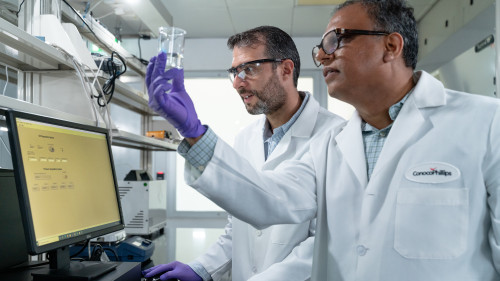 Process Lab, Senior Engineers Joel and Altaf with Reverse Osmosis unit