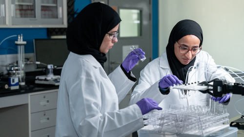 Process Lab - Scientist Eman and Engineer Mashael with Adsorption Unit