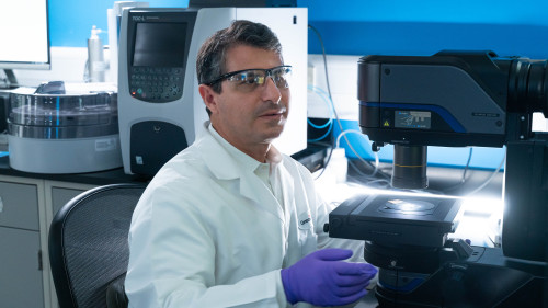 Spectroscopy Lab, Principal Engineer Gennaro with microscope