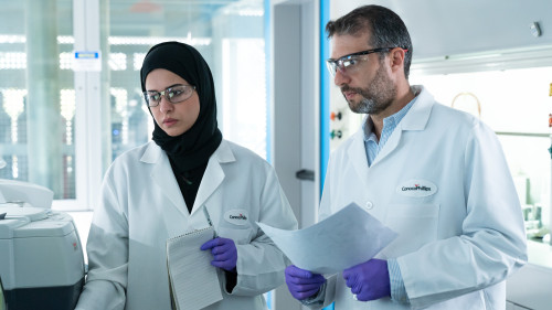 Spectroscopy Lab, Senior Engineer Joel and Scientist Eman with TGA-Fourier Transform Infrared Spectroscopy