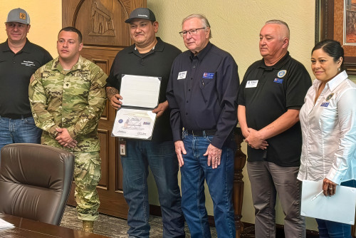Dino Perez receiving award