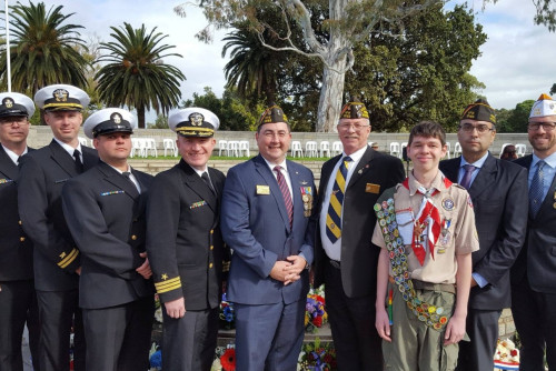 Mike in a group photo with others in uniform