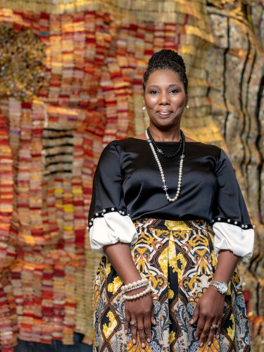 Tonya Jordan standing in the corporate lobby