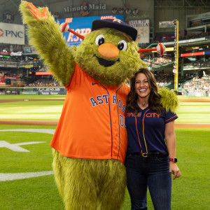 Astros mascot, Orbit with a teacher