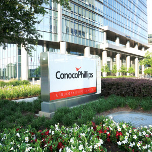 ConocoPhillips sign in front of the corporate headquarters in Houston, TX