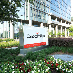 ConocoPhillips sign in front of the corporate headquarters in Houston, TX