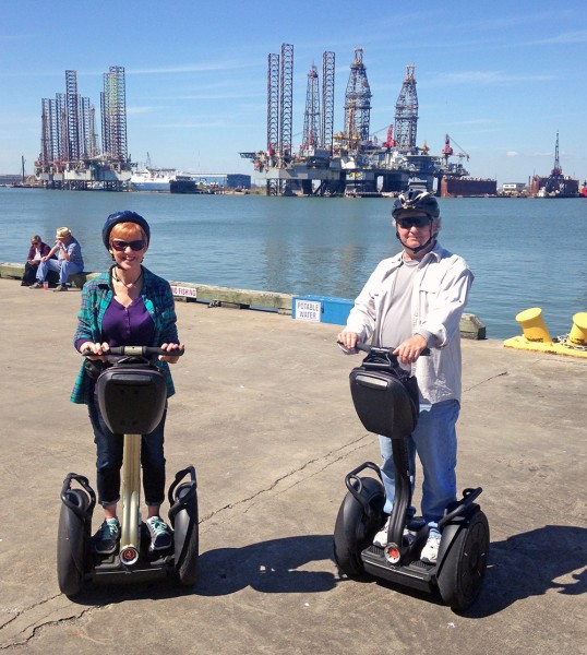 Bob Burton and his wife riding segways in Galveston, Tx