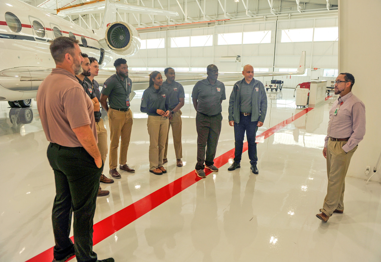 George Smith speaking with academy guests