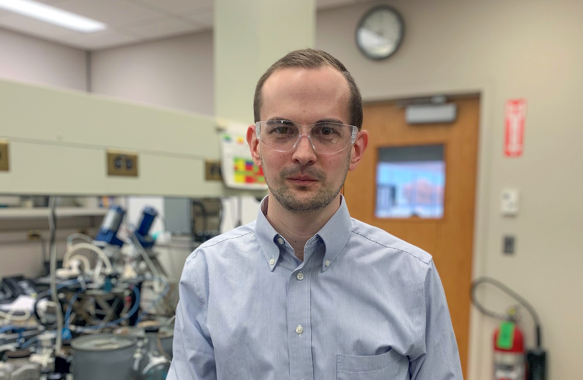 Marc in foreground in lab