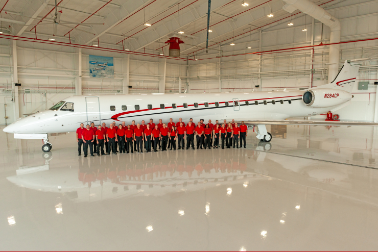 Global Aviation team with the Air Shuttle at the ConocoPhillips hangar at IAH in Houston, Texas.