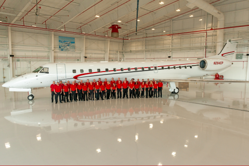 Global Aviation team with the Air Shuttle at the ConocoPhillips hangar at IAH in Houston, Texas.