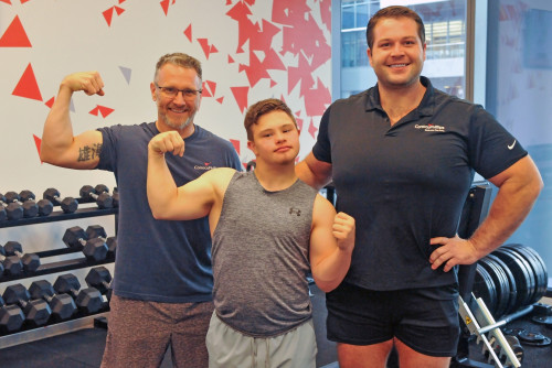 Chris Kocurek, left, Cameron Kocurek and trainer Nathan Kennedy prior to a workout session at the Houston Wellness Center on Jan. 28, 2025.