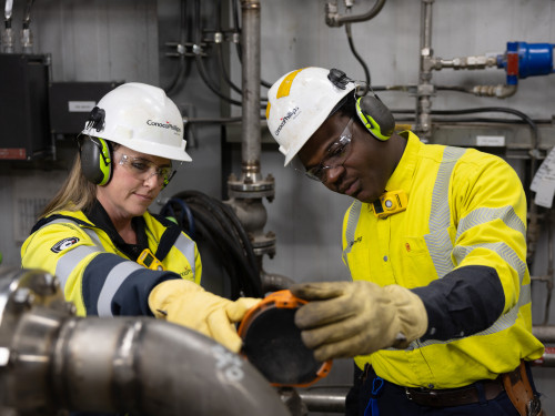 ConocoPhillips workers checking equipment. 