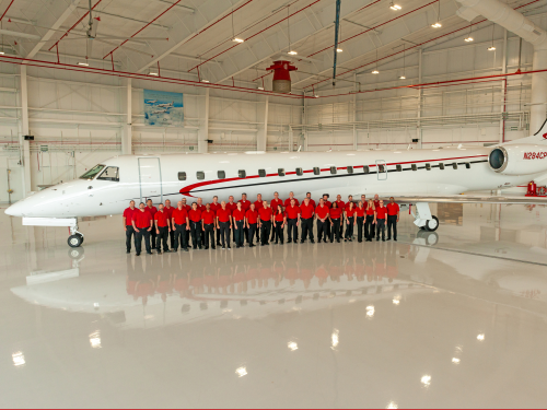 Global Aviation team with the Air Shuttle at the ConocoPhillips hangar at IAH in Houston, Texas.