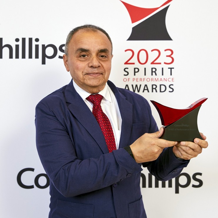 Jesus Contreras displays his 2023 SPIRIT Award for Innovation.