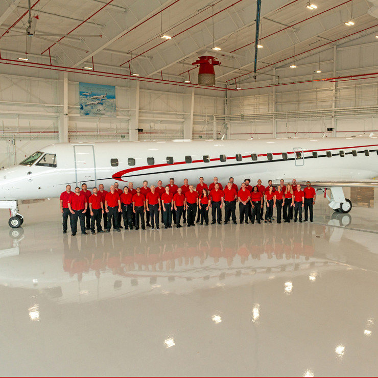 Global Aviation team with the Air Shuttle at the ConocoPhillips hangar at IAH in Houston, Texas.