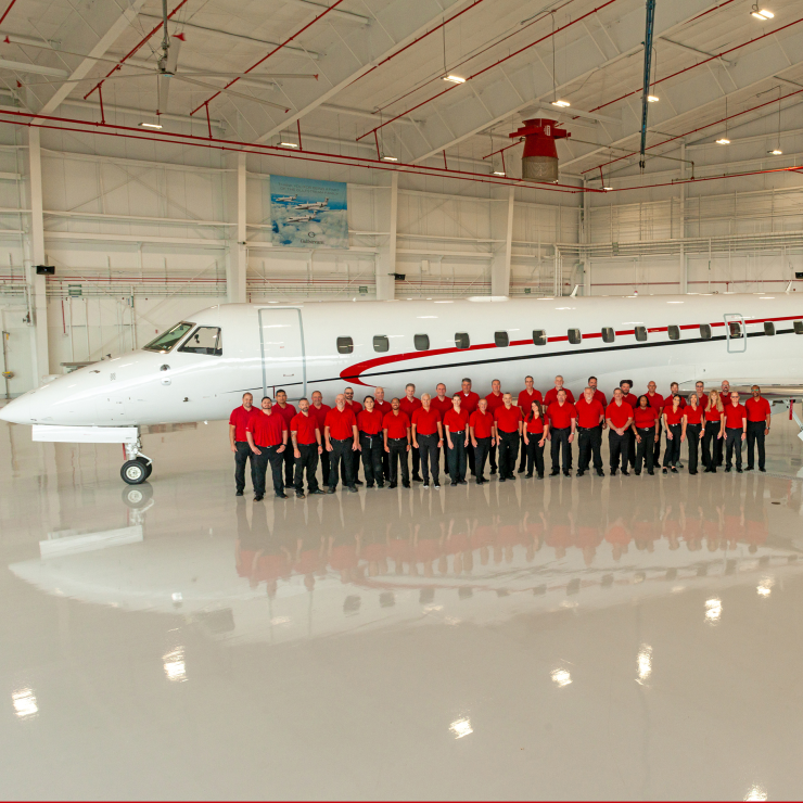 Global Aviation team with the Air Shuttle at the ConocoPhillips hangar at IAH in Houston, Texas.