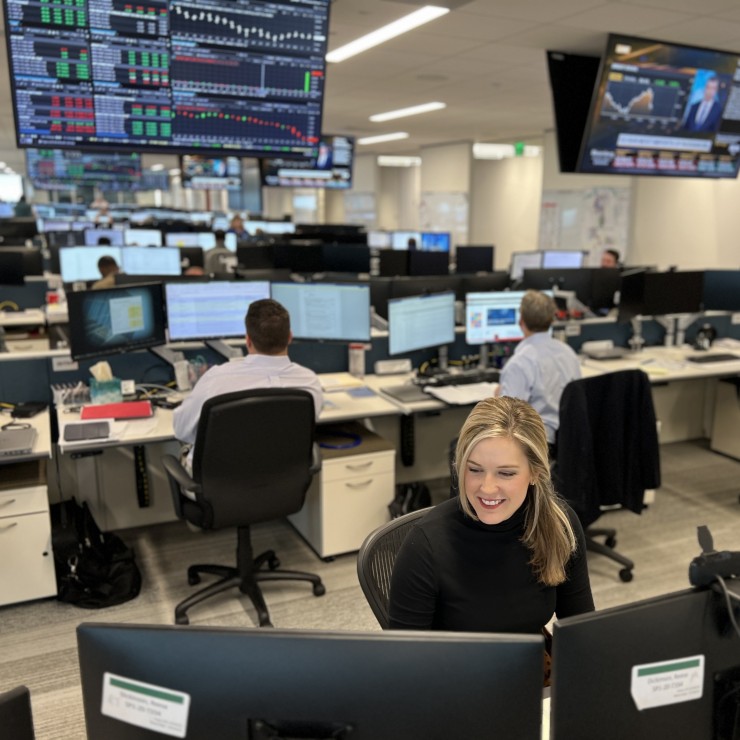 Gulf Coast Crude Oil Scheduler Reese Nixon at work on the Commercial trade floor in Houston.