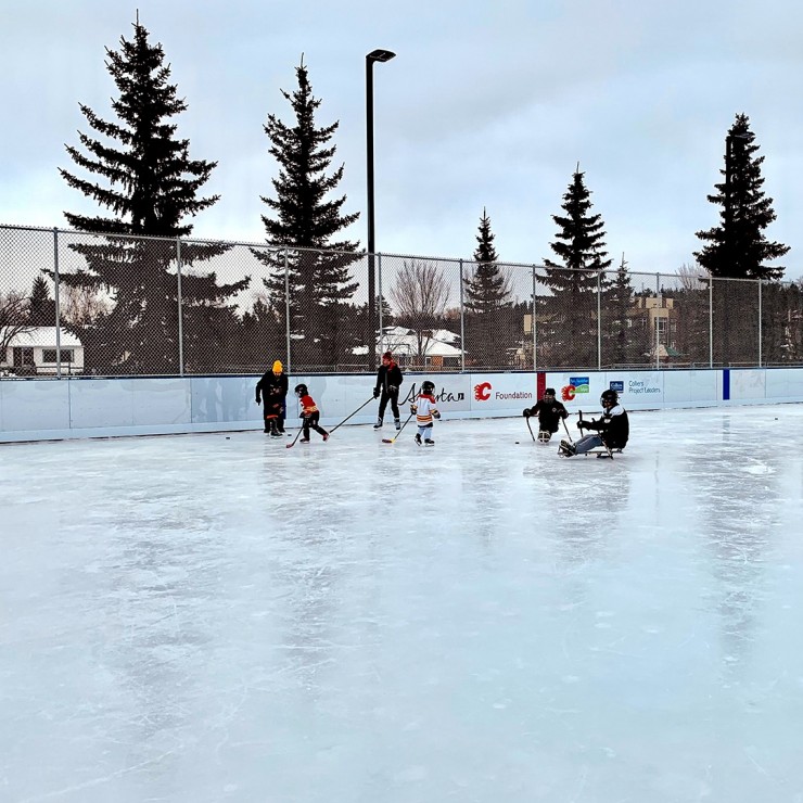 Young people glide across The Parkdale Community Ice Rink