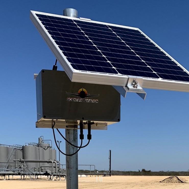 Pole with solar panel on top