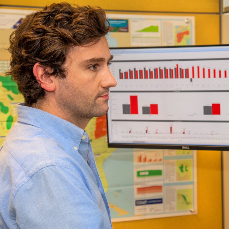 Analytics engineer Steven Cass works on a dashboard at ConocoPhillips Center in Houston.