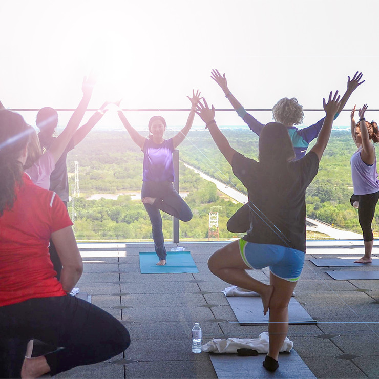 ConocoPhillips employees at yoga class on the rooftop