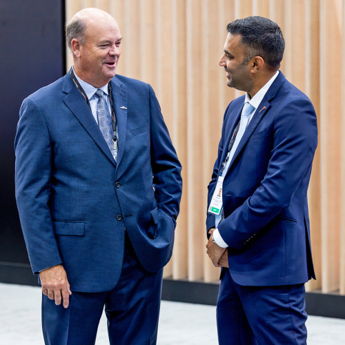 ConocoPhillips Chairman and Chief Executive Officer Ryan Lance, left, discusses the company's LNG business with Global LNG Trading & Origination General Manager Rajiv Panicker at Gastech 2024 in Houston, Texas.