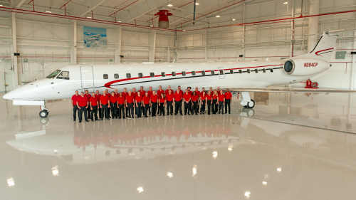 Global Aviation team with the Air Shuttle at the ConocoPhillips hangar at IAH in Houston, Texas.